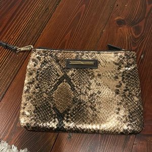 Limited snakeskin purse